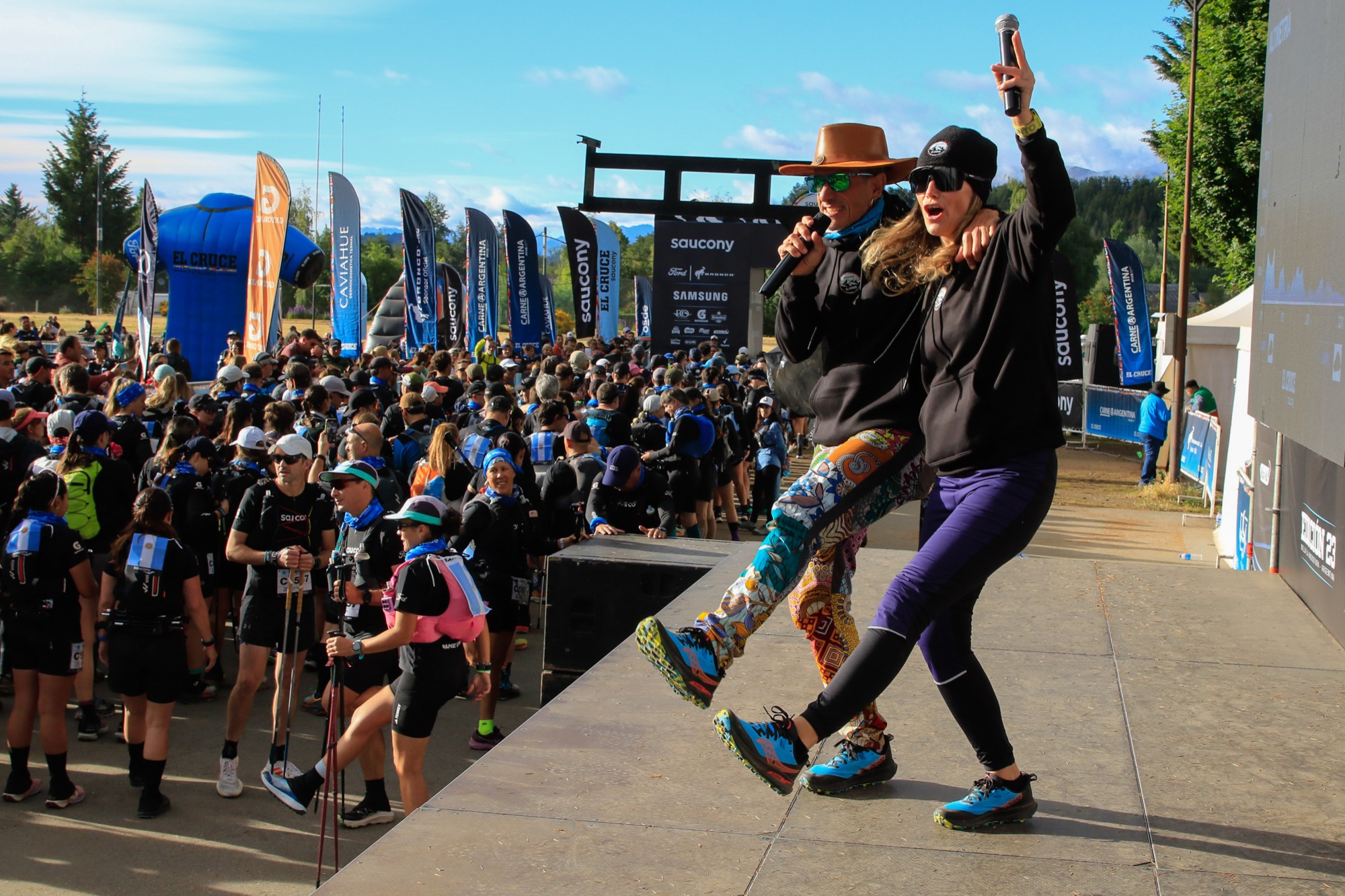 Celebration on stage in front of the runners